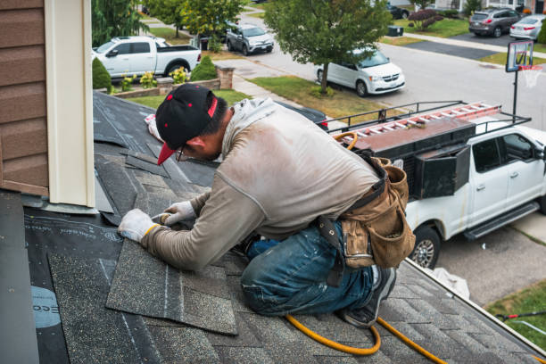 Professional Flat Roof Repair technician working in East Templeton, MA